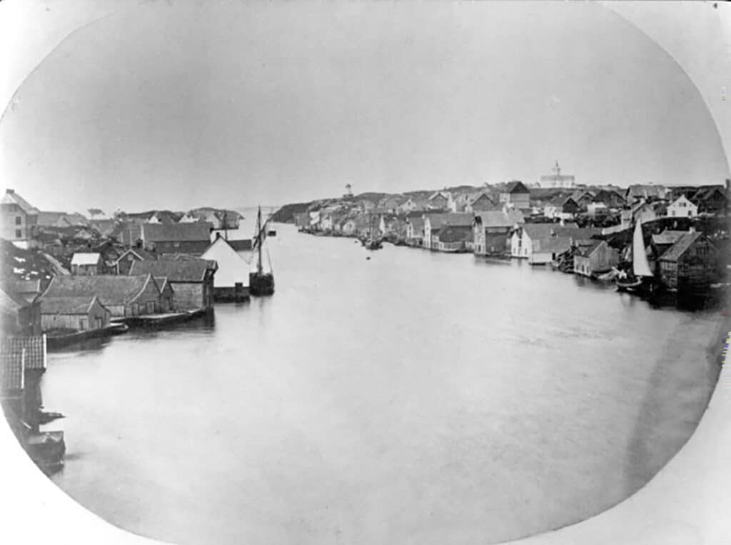 Haugesund hamn på 1860‑talet, fotografert av M. Selmer
